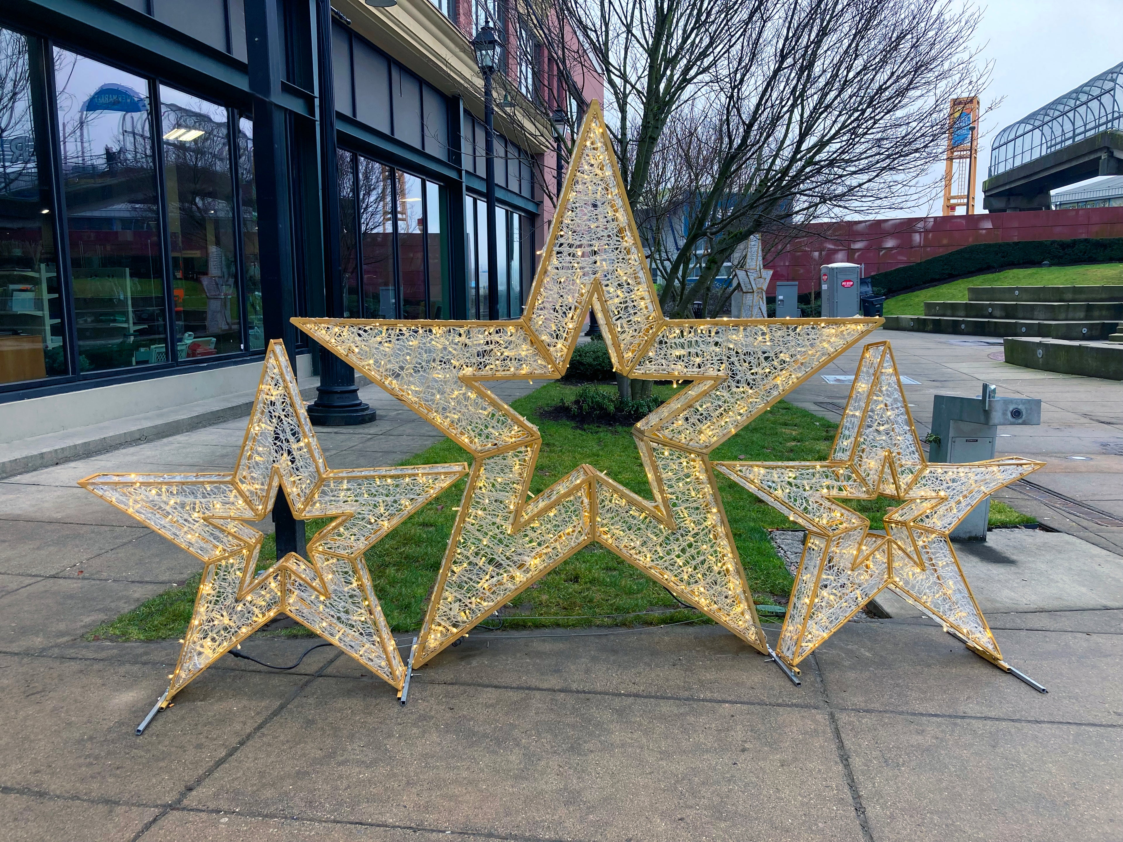 2022 Holiday Decorations from HolidayLights.com 5 Pointed Stars Cluster of Three Life-sized Display Lit with White LED Bulbs and Handcrafted Gold Frame